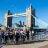 ShelterBox fundraisers jumping in front of Tower Bridge