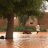 Young man pulls cart through floodwaters in Niger