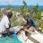 2 men rebuilding a roof in Dominica