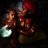 A mother and her child holding a solar light.