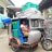 Woman in a rickshaw with ShelterBox aid