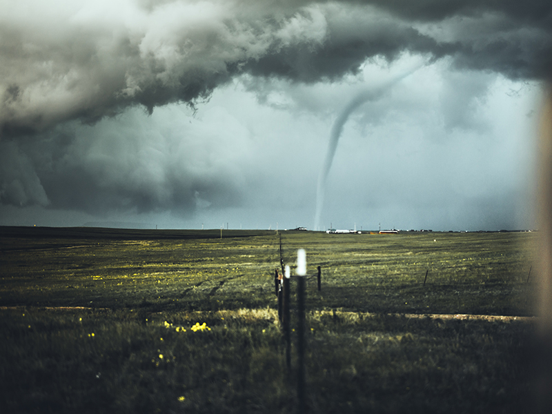 tornado or twister over a field